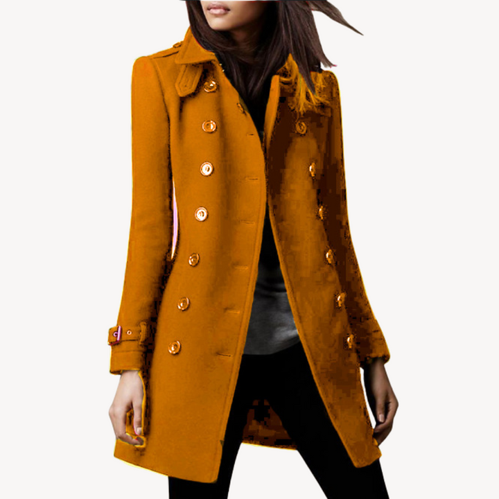Sleek profile of a women's mid-length double-breasted peacoat, a chic & classic elegant winter jacket.