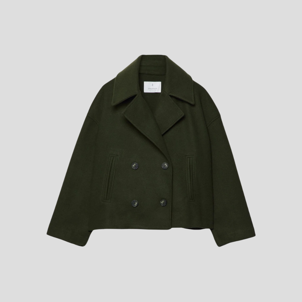 Timeless women's elegant double-breasted short coat. Classic outerwear with a tailored fit for chic fashion.