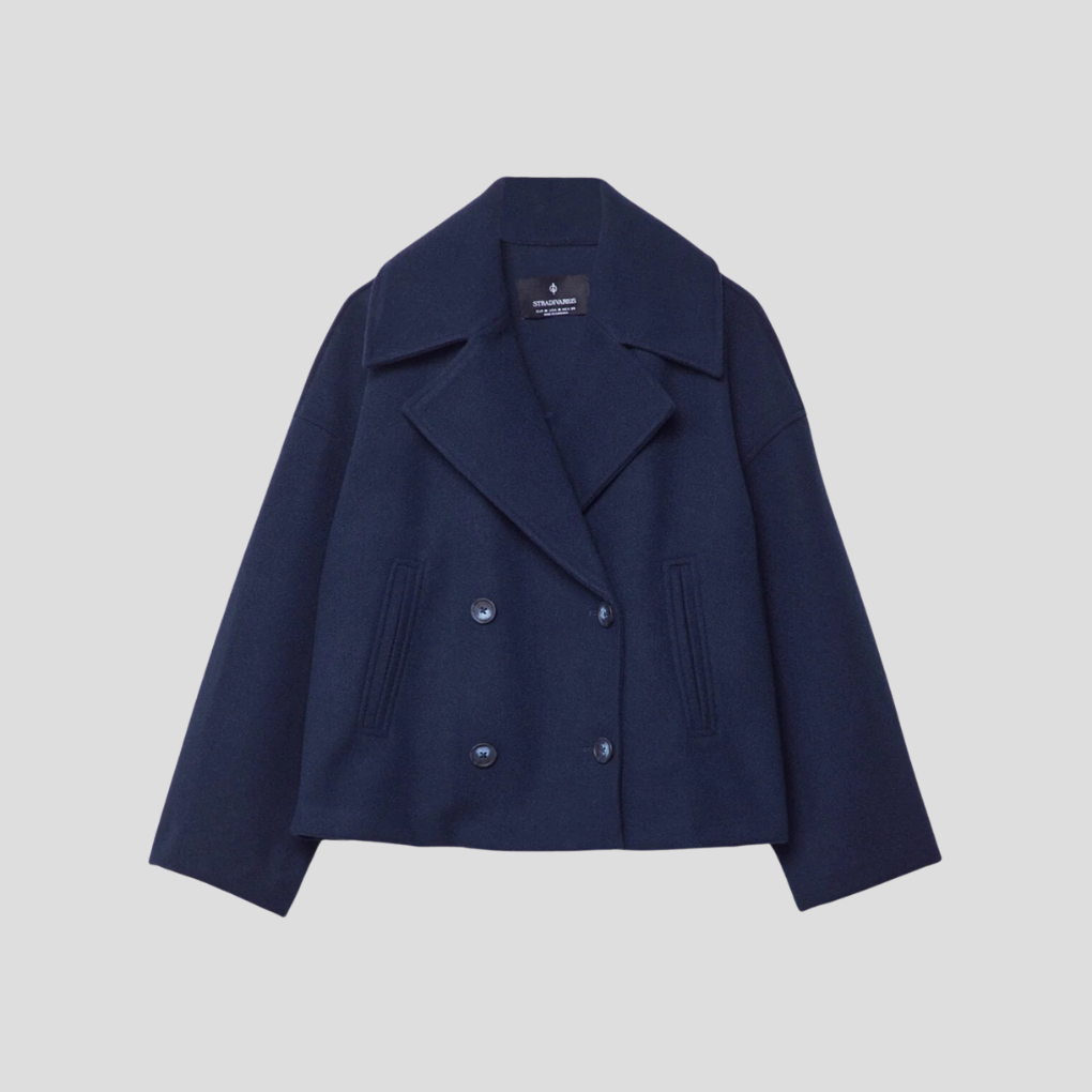 Stylish women's short coat, double-breasted design for an elegant, tailored fit. Chic and versatile outerwear.