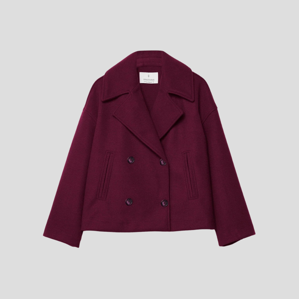 Elegant women's double-breasted jacket, a chic short coat with a classic, tailored fit. Versatile outerwear.