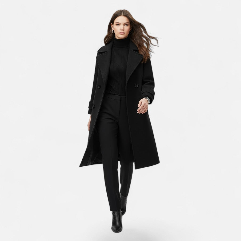 Stylish women's longline double-breasted coat with a slim fit, ideal for elegant outerwear and fall fashion.