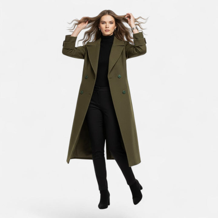 Stylish women's longline trench coat with a double-breasted, slim fit silhouette. Elegant outerwear for fall/winter.