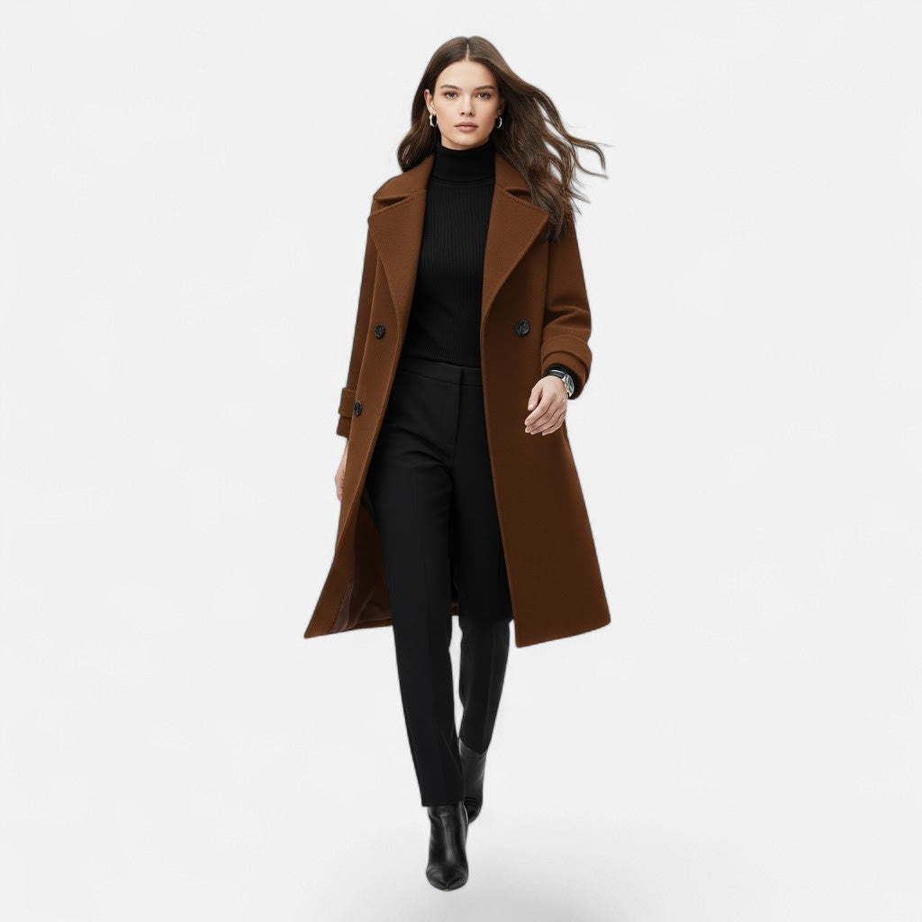 Elegant women's longline coat, double-breasted and slim-fitting. A timeless classic for sophisticated fall & winter fashion.