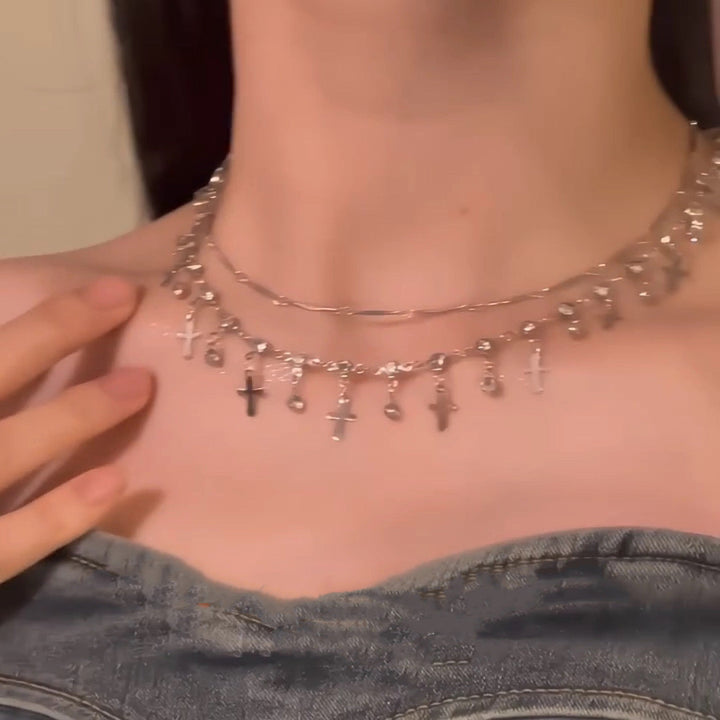 Elegant women's double layer cross pendant necklace, a stylish and spiritual fashion accessory.
