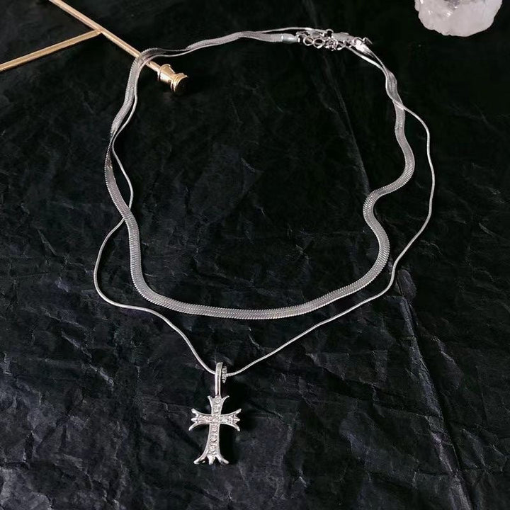 Delicate women's double layer silver tone cross pendant necklace. Elegant religious jewelry, ideal gift for her.