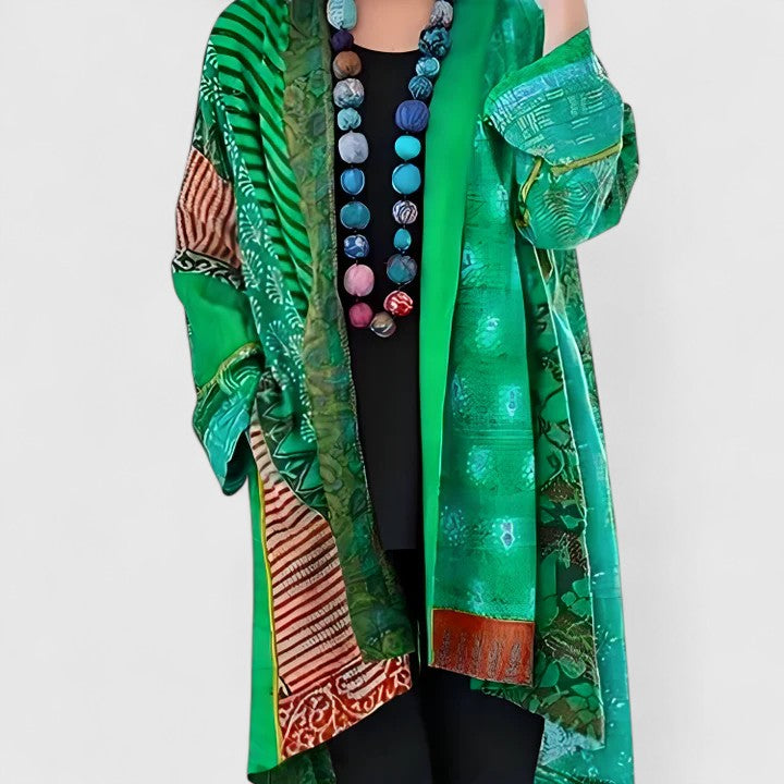 Chic women's elegant draped long sleeve cardigan. Versatile and comfortable outerwear, ideal for stylish layering.
