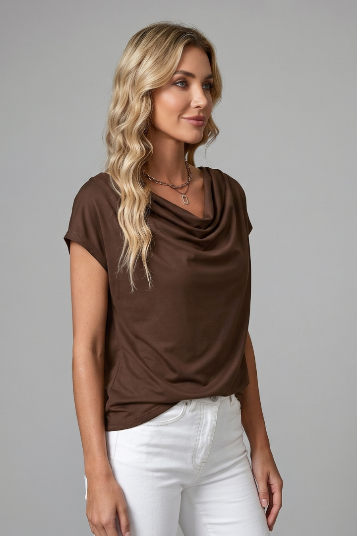 Chic women's draped cowl neck blouse, soft and comfortable for spring and summer fashion.