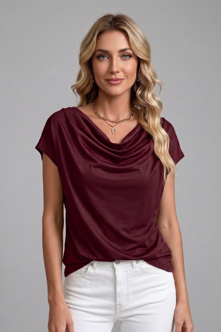 Modern women's fashion top: short sleeve, draped design, and elegant cowl neck blouse.