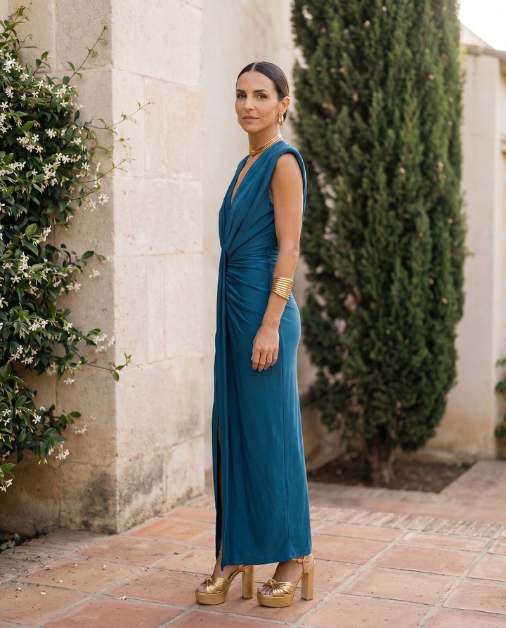 Women's elegant draped evening dress. Flattering formal gown for special occasion and party wear.