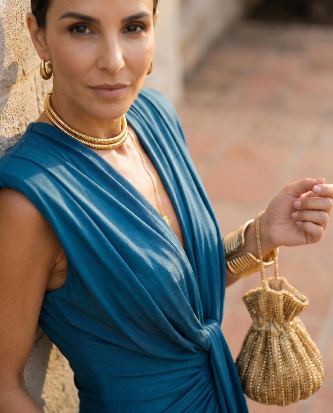 Luxurious draped evening dress for women. Elegant formal gown with a flattering fit for premium event wear.