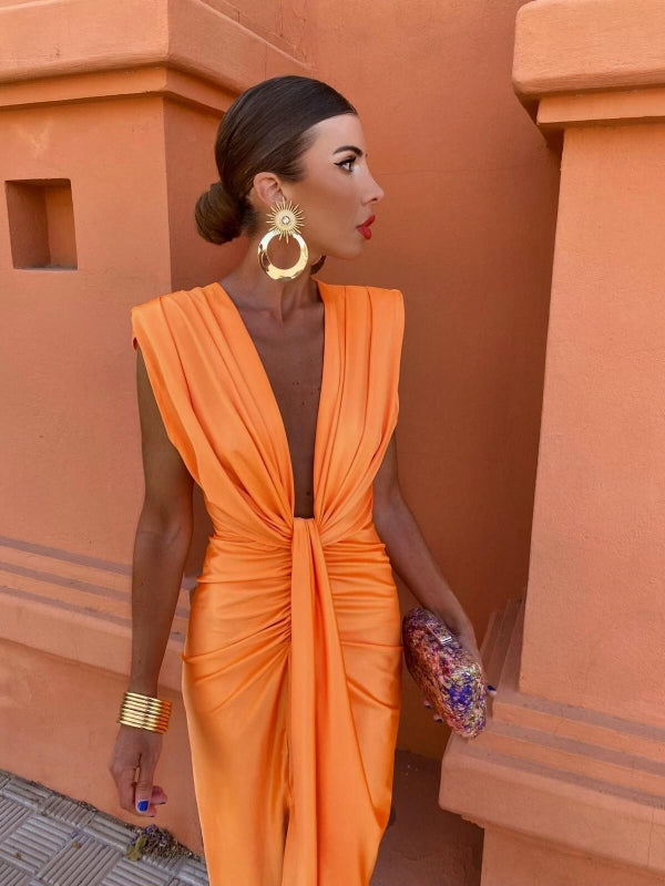 Vibrant orange women's draped evening gown. Elegant formal dress, perfect for special occasion events.