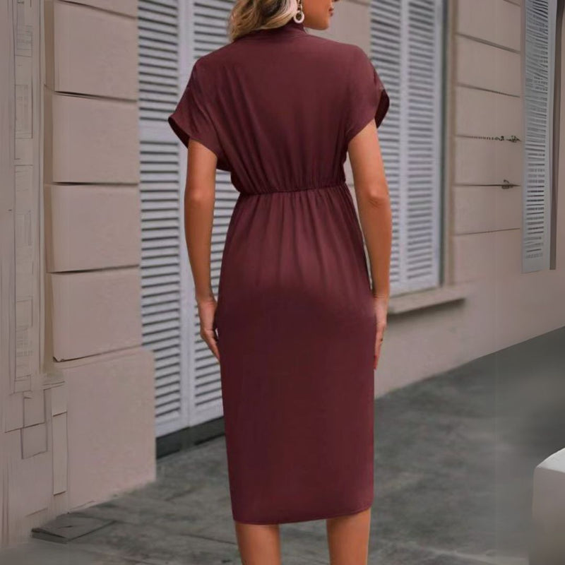 Chic midi dress for women featuring elegant draping, a flattering V-neck, cap sleeves & unique tulip hemline.