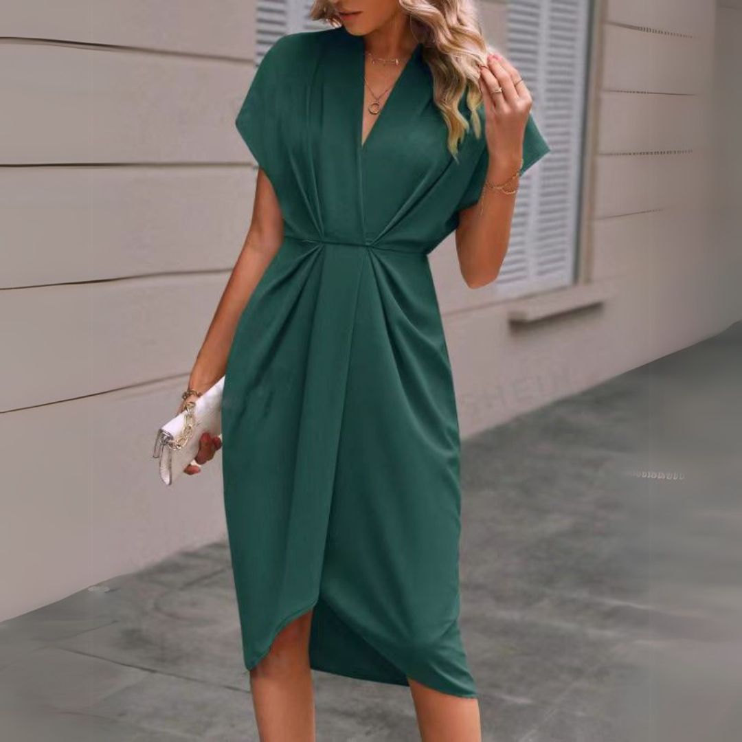 Women's elegant workwear midi dress with draped style, flattering V-neck, cap sleeves & stylish tulip hem.