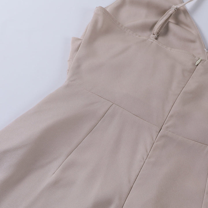 Women's elegant evening midi dress, featuring drapes, spaghetti straps, and a sexy leg split.