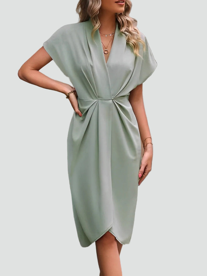 Women's elegant draped V-neck midi dress with split, flowing gracefully. Perfect for parties & formal occasions.