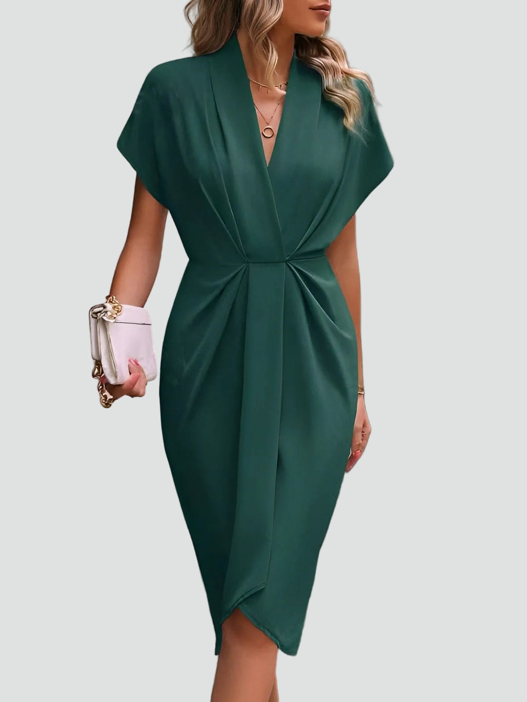 Women's elegant midi dress with a sophisticated split, V-neck, and chic draped design. Ideal for occasions.