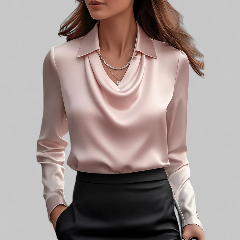 Dressy women's elegant blouse featuring a draped neckline and long sleeves.