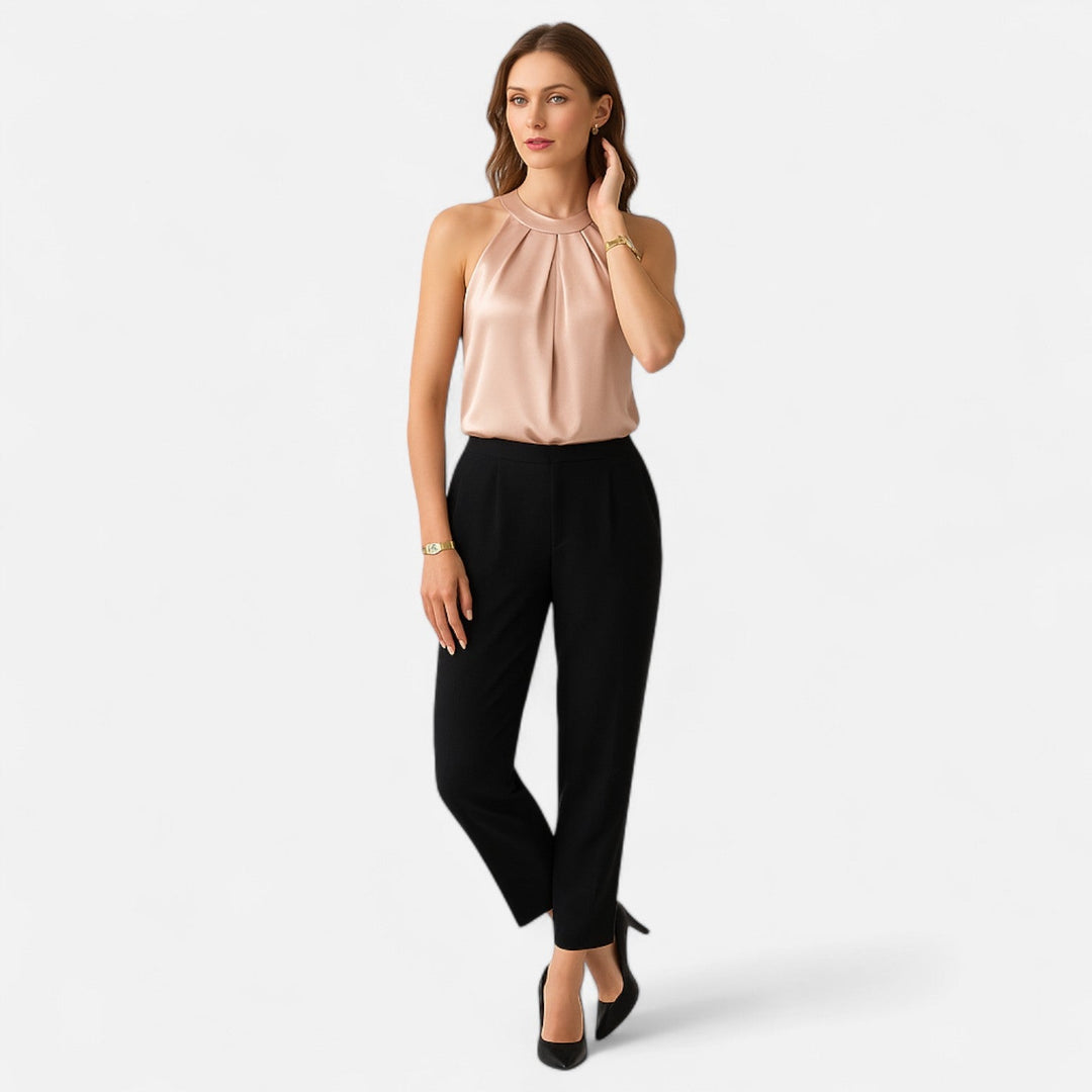 Fashionable women's sleeveless top, exquisitely draped with soft fabric, offering comfortable and elegant style.