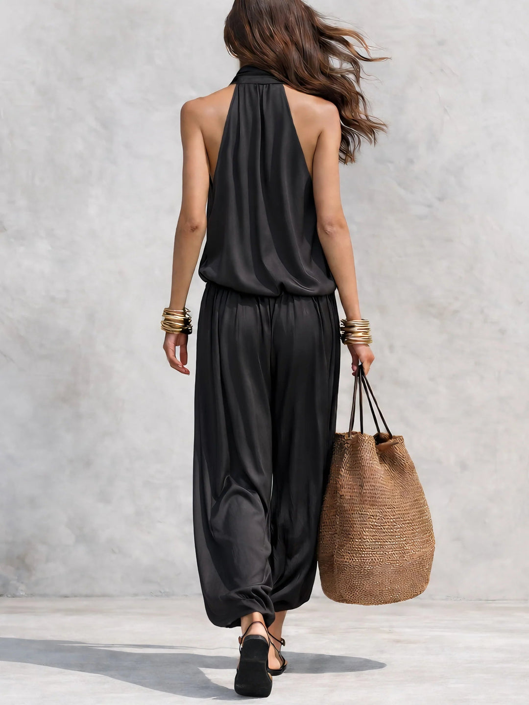 Stylish women's draped two-piece set featuring a relaxed fit. Perfect for comfortable, chic summer evening wear.