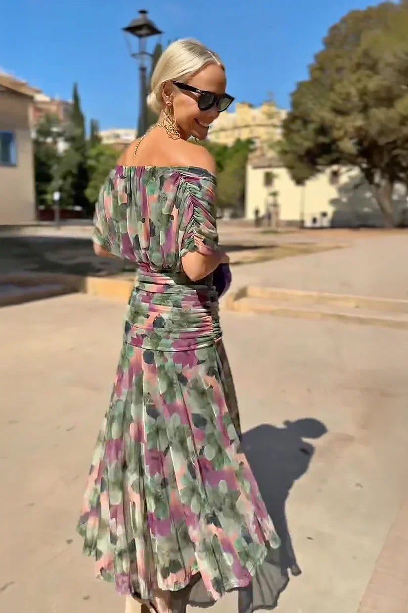 Graceful women's draped maxi dress featuring a V-neck, designed for elegant occasions and evening wear.