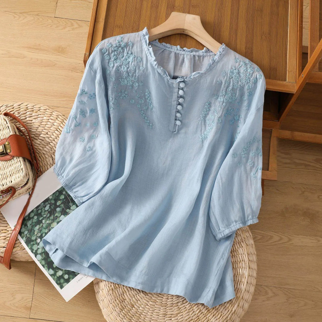 Elegant women's embroidered 3/4 sleeve blouse with relaxed fit, perfect for spring and summer fashion.
