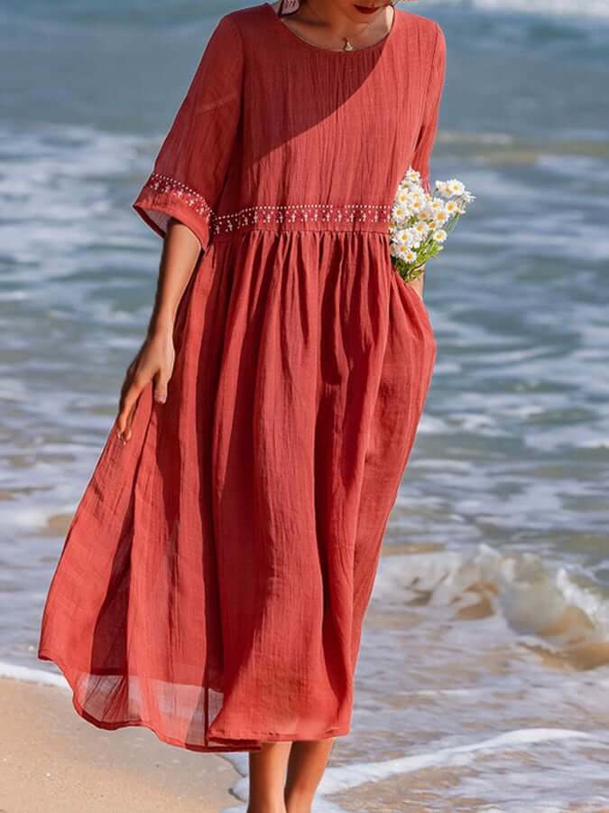 Comfortable elegant loose-fit women's dress, featuring beautiful embroidery for spring fashion.
