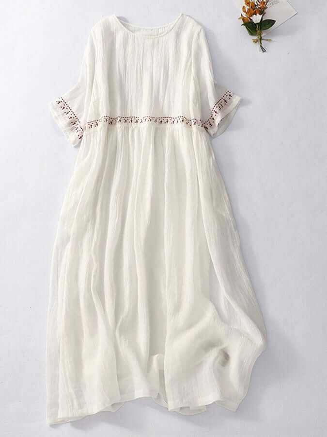 Red elegant embroidered flowy dress for women, perfect for casual spring and summer style.