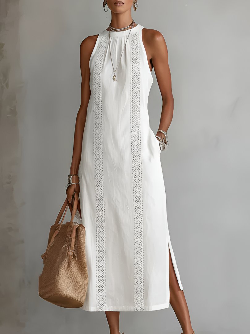 Sophisticated women's sleeveless midi dress with intricate embroidery, ideal for evening or vacation.
