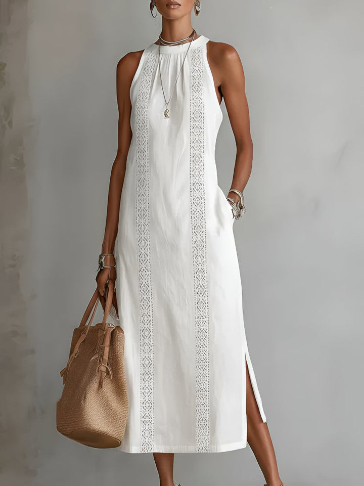 Sophisticated women's sleeveless midi dress with intricate embroidery, ideal for evening or vacation.