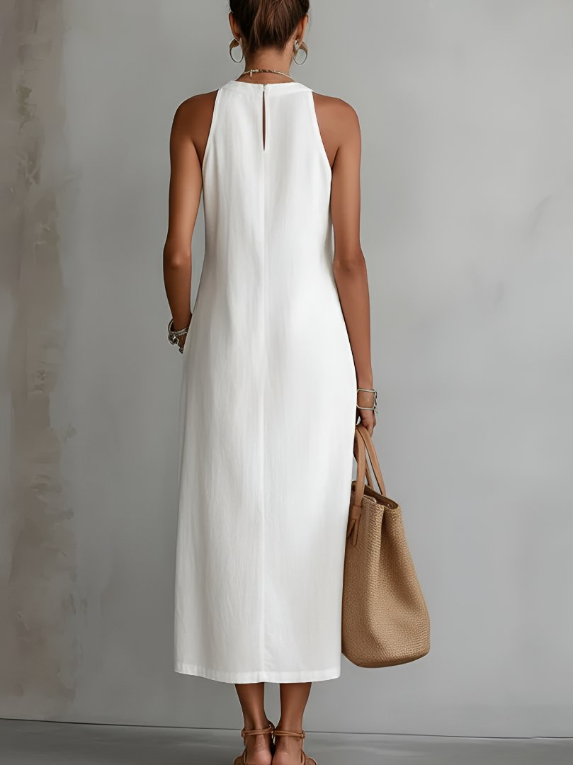 Women's elegant round neck embroidered midi dress; a stylish sleeveless choice for summer fashion.
