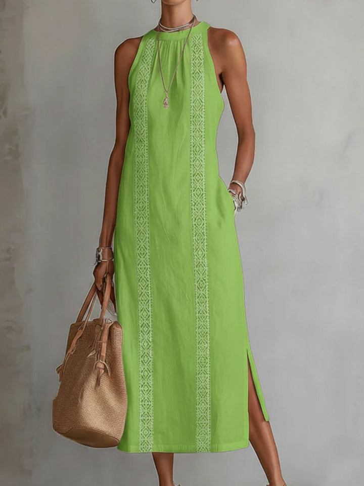 Chic women's embroidered sleeveless midi dress, an elegant summer fashion statement for any occasion.