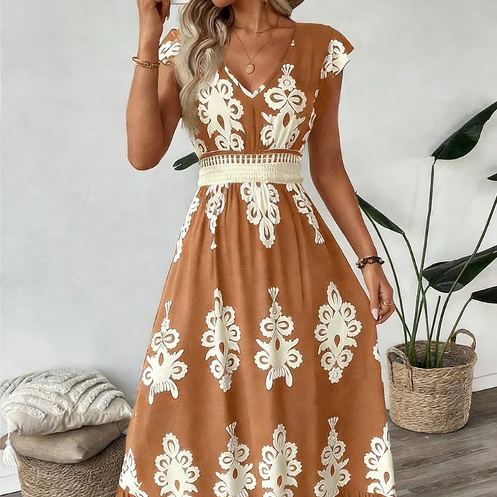 Elegant women's embroidered V-neck midi dress styled with accessories for a complete party look.