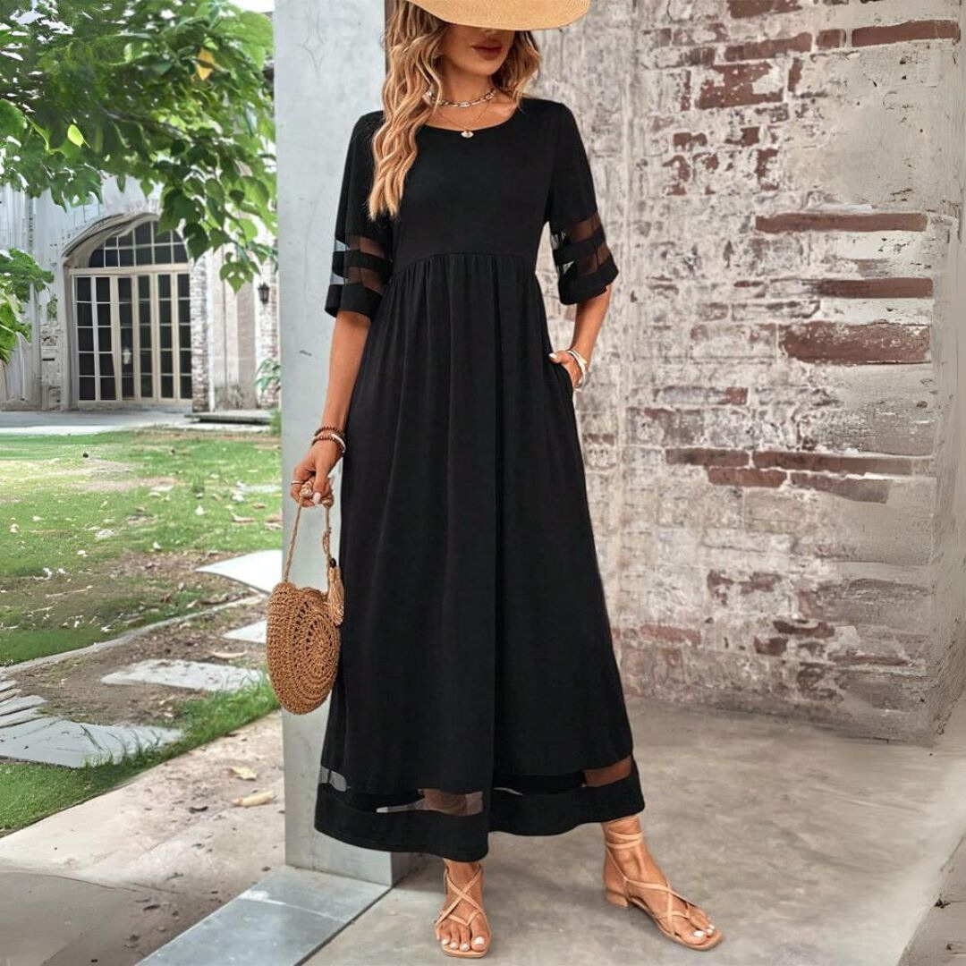 Elegant women's empire waist maxi dress, flattering style perfect for evening events or summer.