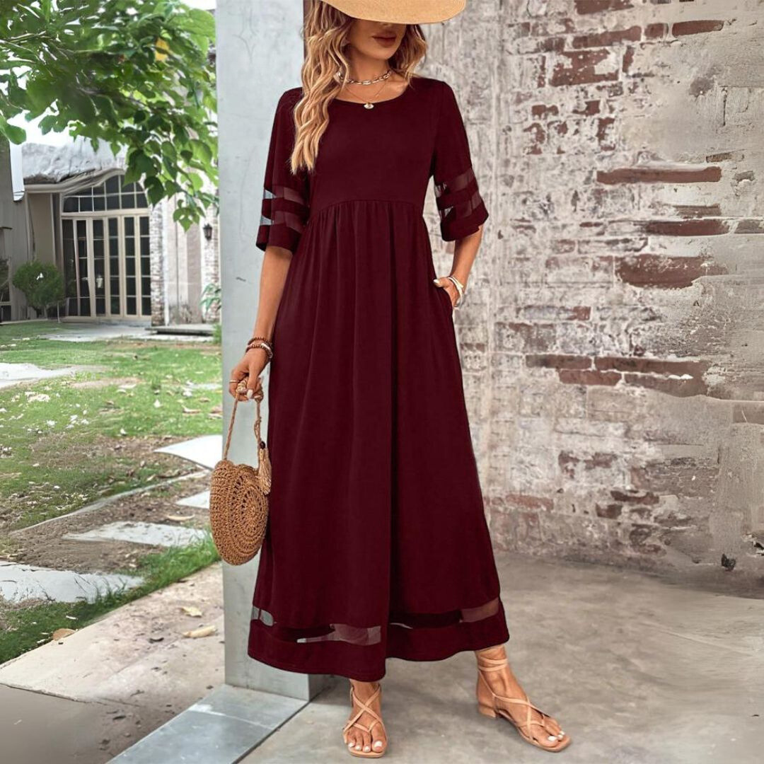 Stylish empire waist maxi dress for women, offering a comfortable and elegant look for any occasion.