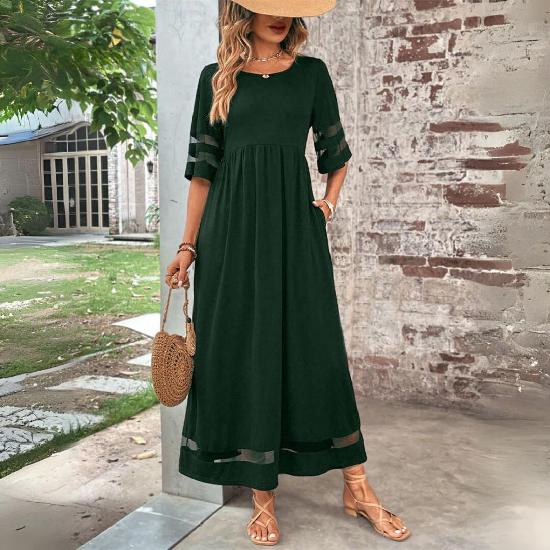 Comfortable women's elegant maxi dress, features a flattering empire waist for a versatile fit.