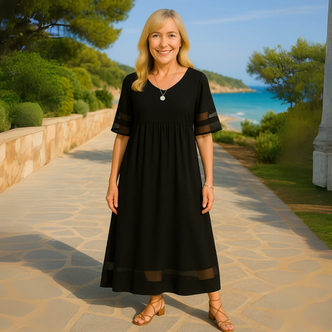 Long, flowing empire waist maxi dress for women, an elegant and comfortable summer dress option.