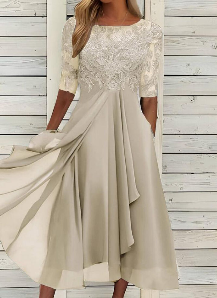 Women's elegant maxi dress with a round neck and half sleeves. Ideal for formal parties & special occasions.