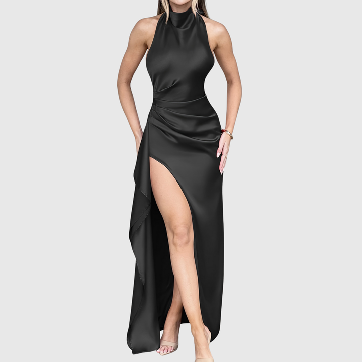 Women's elegant evening dress. Formal gown with a sleek design, high neckline, & graceful thigh slit.