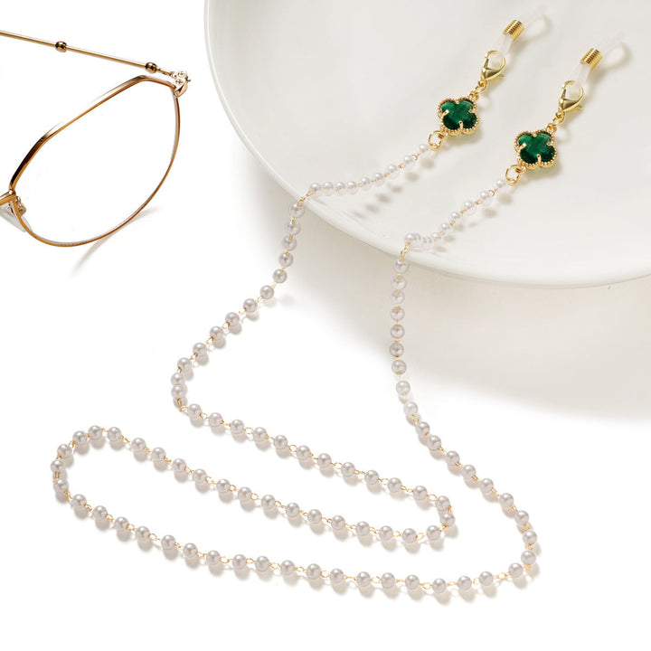 Elegant women's eyeglass chain with pearl accents for stylish and secure eyewear holding.