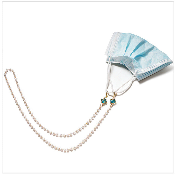 Secure women's pearl eyeglass holder chain, a stylish and elegant accessory for fashion eyewear.