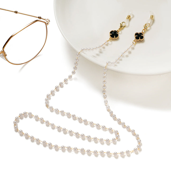 Women's secure pearl-accented eyeglass chain, a stylish eyewear accessory.