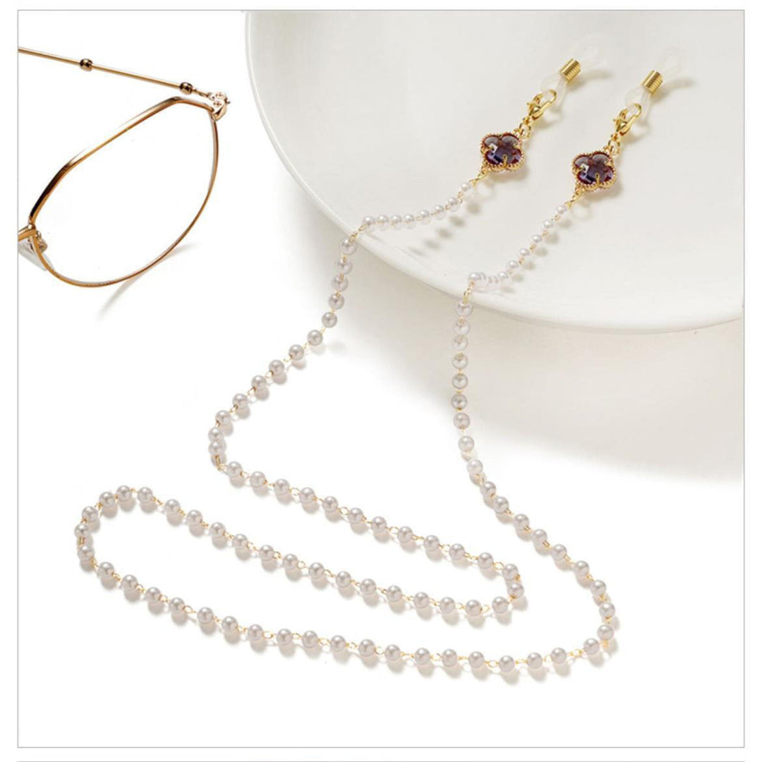 Stylish women's pearl eyeglass chain. Secure and elegant glasses holder.