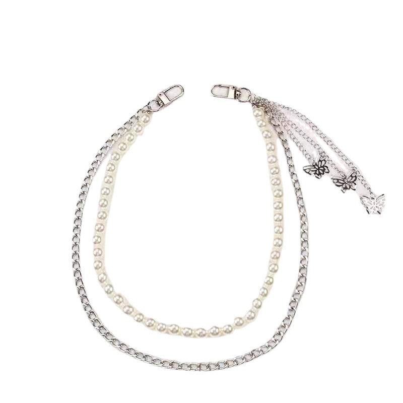 Exquisite women's accessory: pearl & chain belt featuring a beautiful butterfly pendant, perfect for adding elegance.