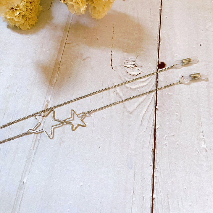 Adjustable gold-tone filigree star pendant necklace. Stylish women's elegant fashion accessory, great gift for her.