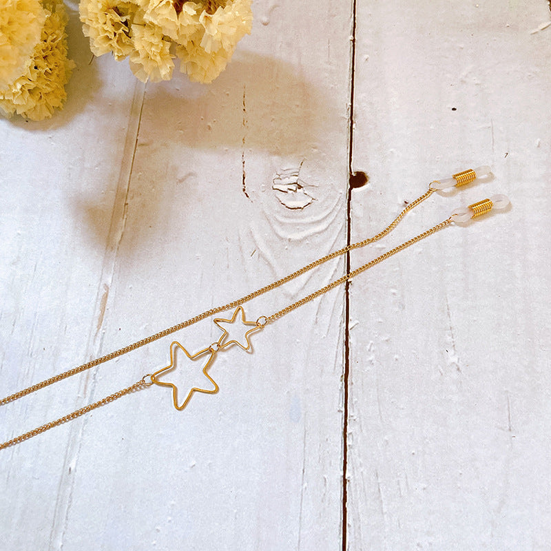 Intricate filigree star pendant necklace, showcasing delicate craftsmanship. Elegant women's celestial jewelry.