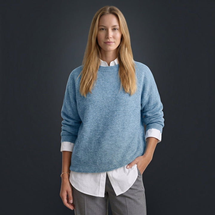 Versatile women's long sleeve knit pullover sweater, ideal for casual everyday wear in fall & winter.