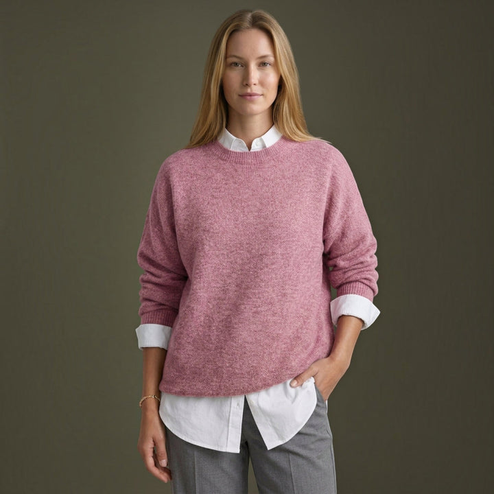 Soft fine knit women's pullover sweater with long sleeves, offering warmth & comfort for any occasion.