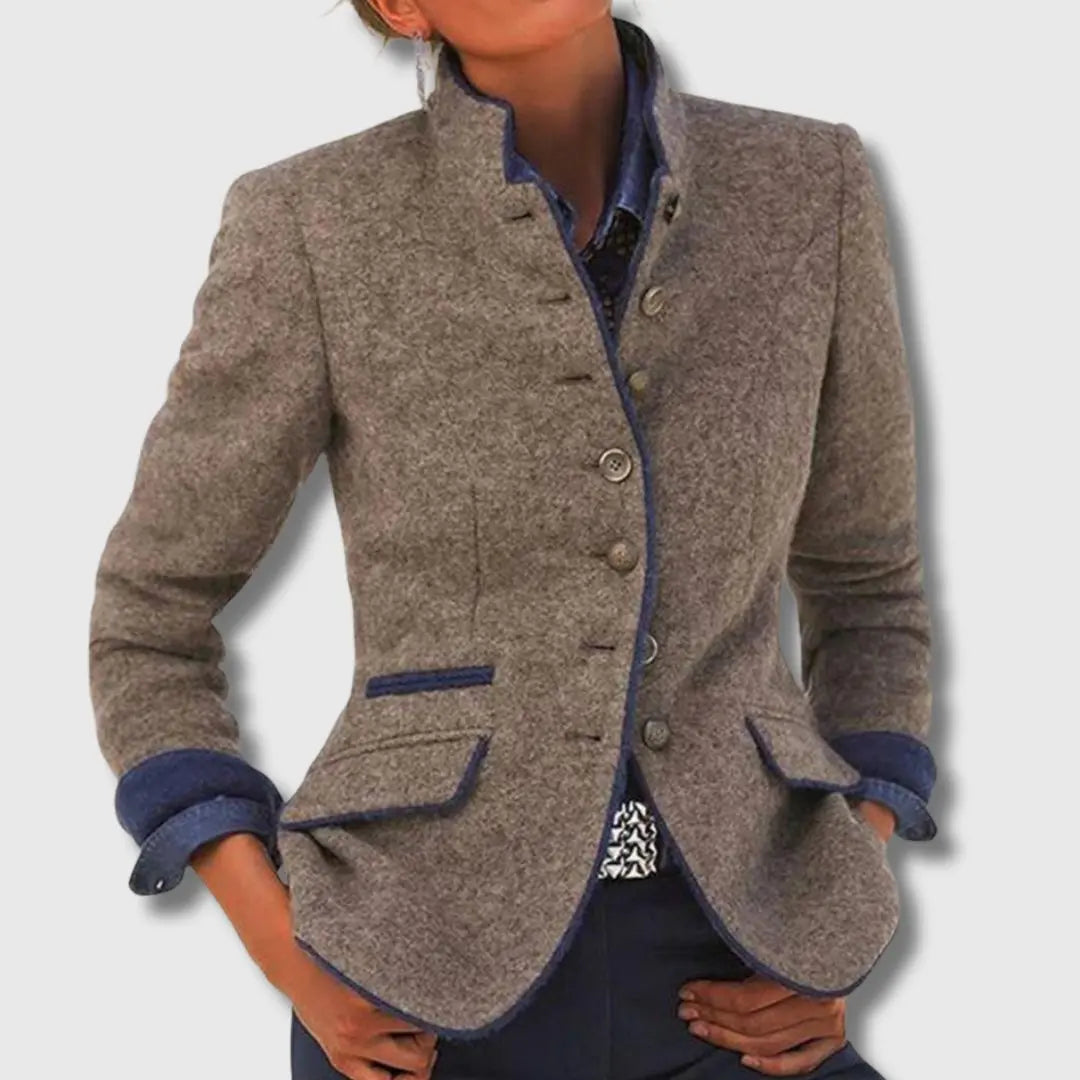 Elegant women's fitted blazer with stylish contrast trim, perfect for office wear & professional look.