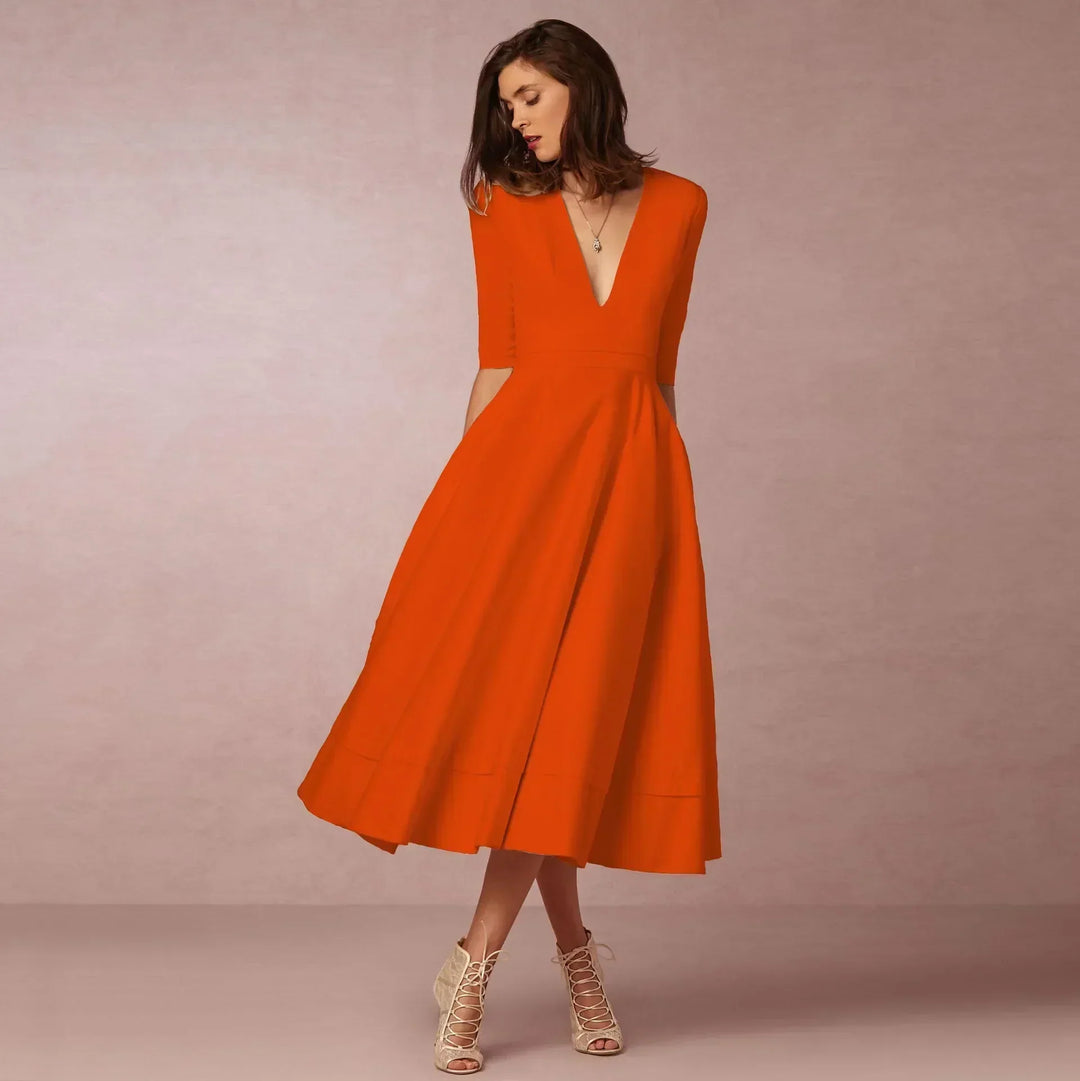 Versatile women's fitted midi dress, perfect for summer elegance, cocktail parties, or a chic day out.
