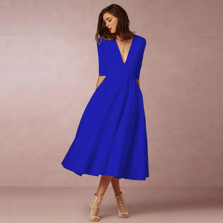 Classic black elegant fitted midi dress for women, essential summer fashion for formal & casual events.